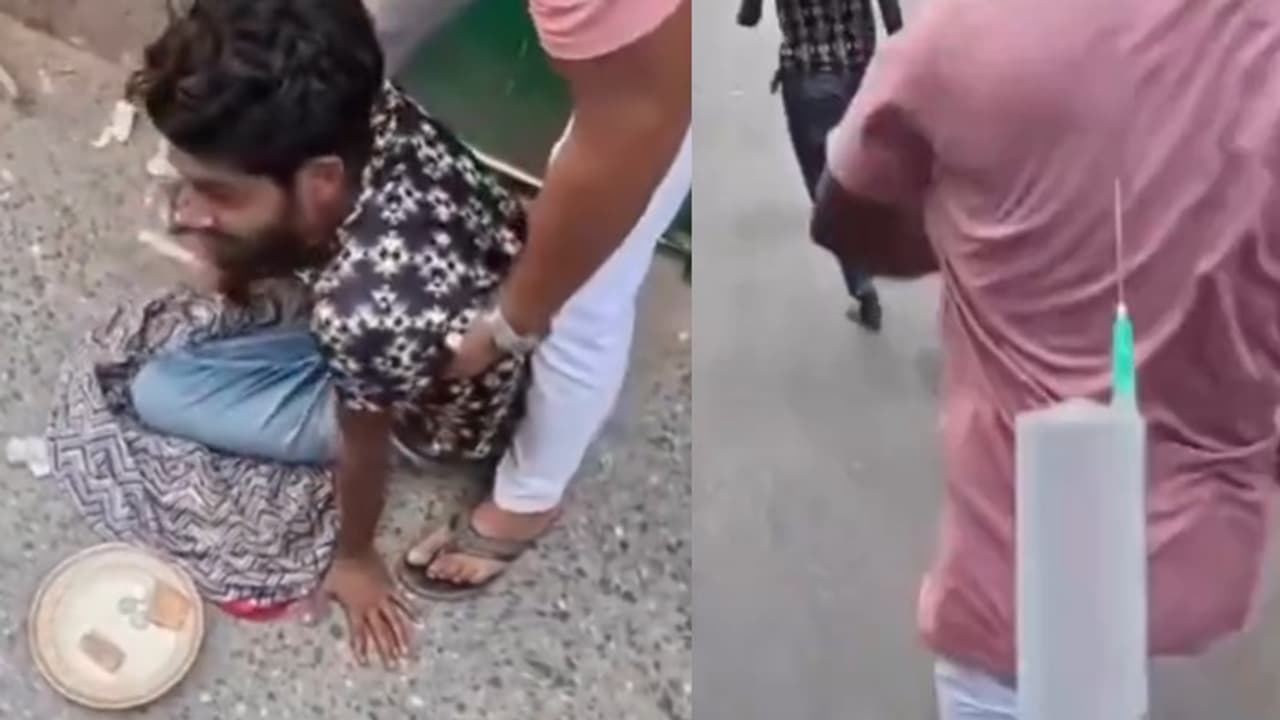 Viral Video: Beggar Pretending To Be Paralysed on Street Gets Up and Runs After Being Offered Treatment (WATCH)