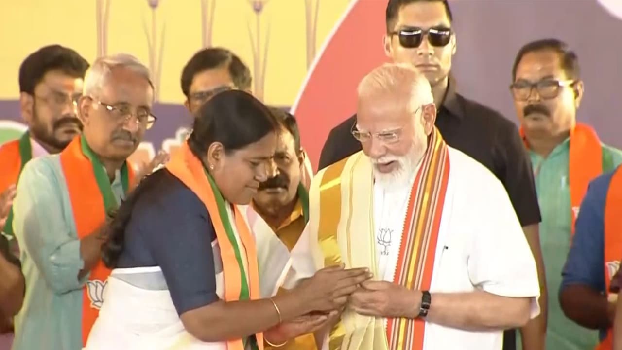 PM Modi embraces Kerala culture in mundu, plays chenda in Palakkad