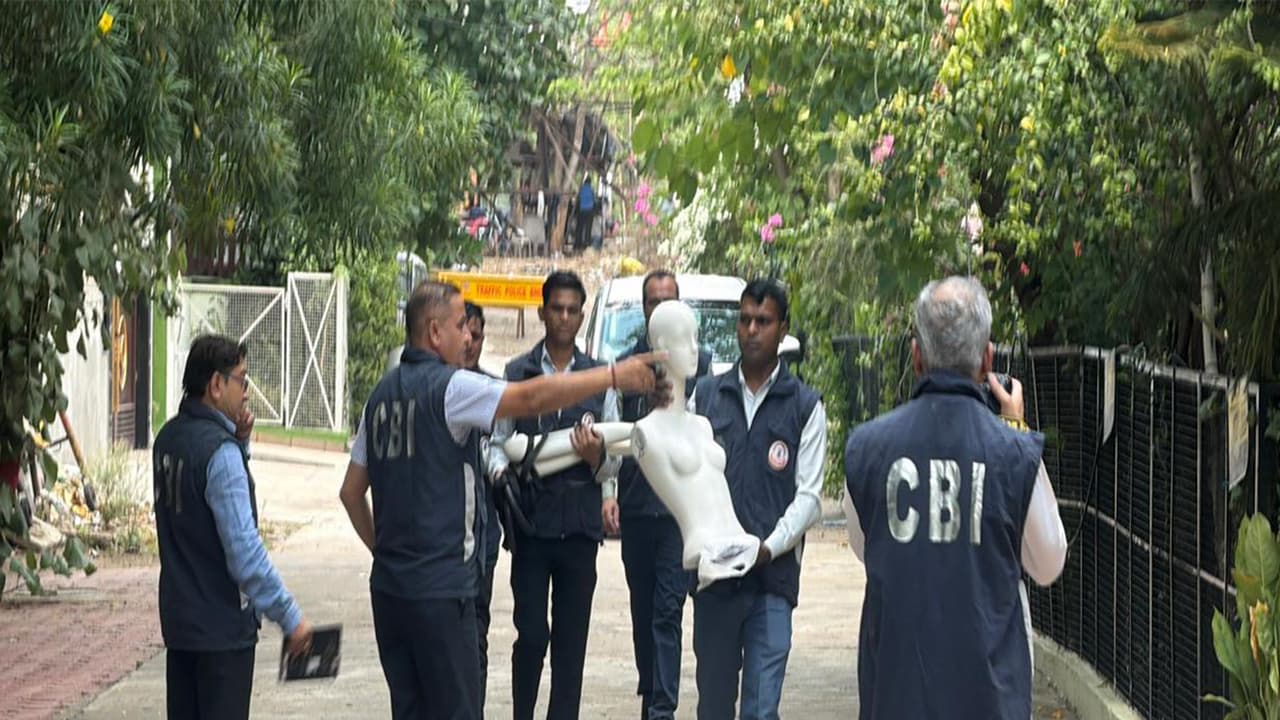 CBI team visits ex-judge Giribala Singh's residence in the Twisha Sharma dowry-harassment case, recreating the crime scene with a dummy body. Singh and her son Samarth are accused. A silent protest was held in Noida demanding justice for Twisha.