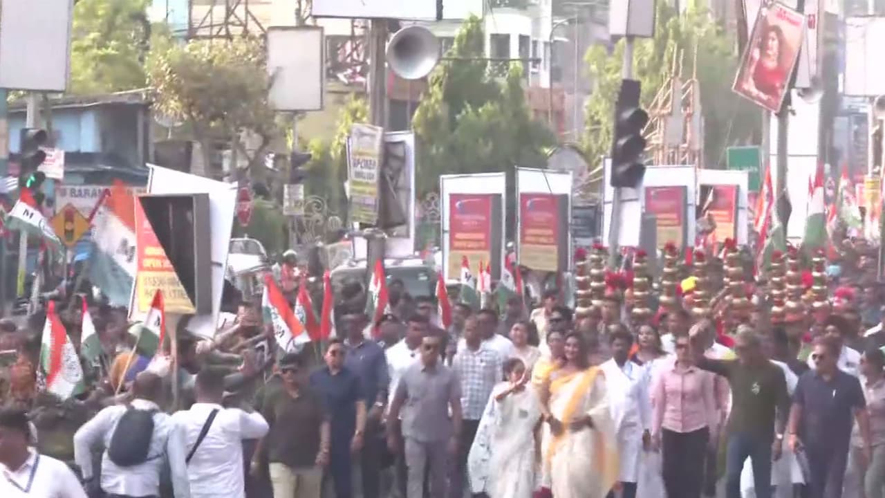 Mamata holds massive roadshow, vows court action over voter lists