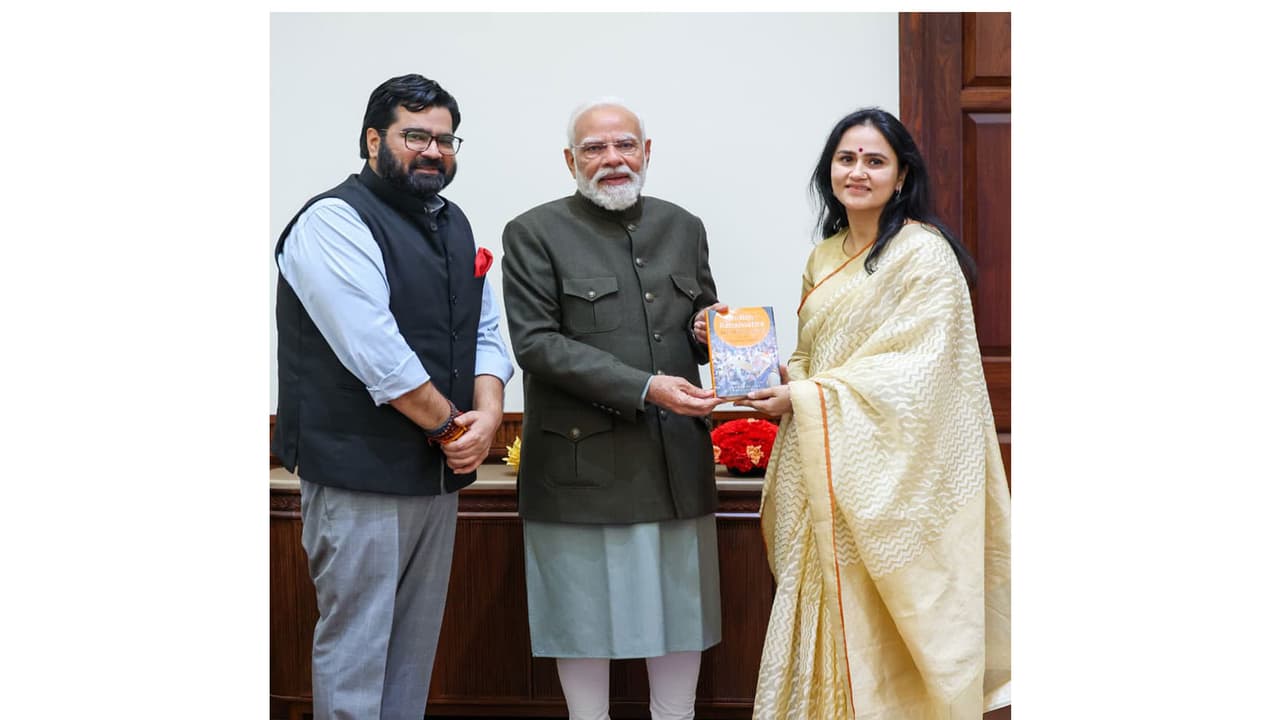 Rajya Sabha MP Kartikeya Sharma, wife meet PM Modi, present book