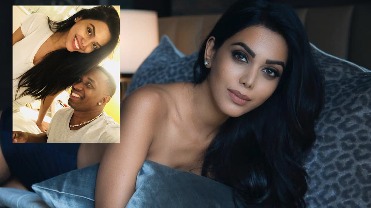 In Pics: Dwayne Bravo’s girlfriend goes topless In Pics: Dwayne Bravo’s girlfriend goes topless