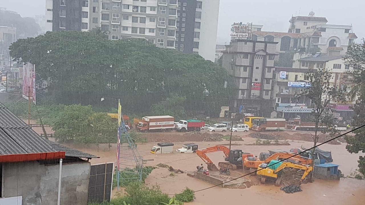 Heavy rains lash Udupi, Mangaluru, houses roads inundated, normal life affected Heavy rains lash Udupi, Mangaluru, houses roads inundated, normal life affected