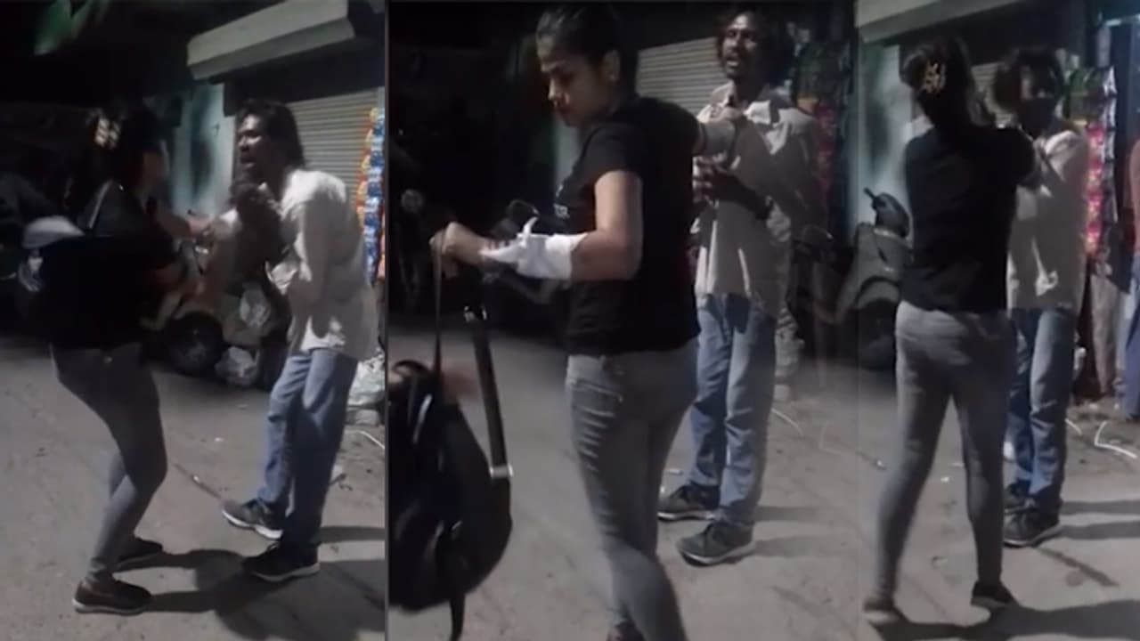 ఆకతాయిని నడిరోడ్డులో చితకబాదిన యువతి (వీడియో) ఆకతాయిని నడిరోడ్డులో చితకబాదిన యువతి (వీడియో)