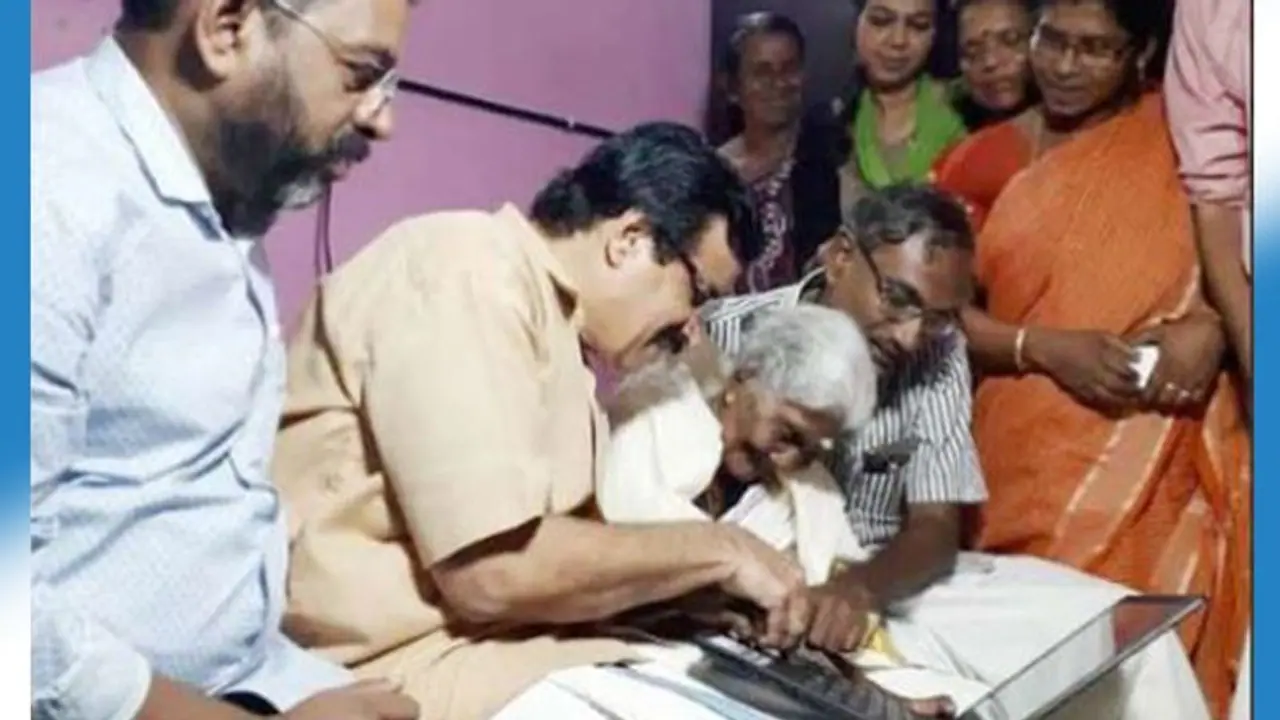 Karthyayani Amma tops exams, gets laptop from Kerala minister C Raveendranath Karthyayani Amma tops exams, gets laptop from Kerala minister C Raveendranath