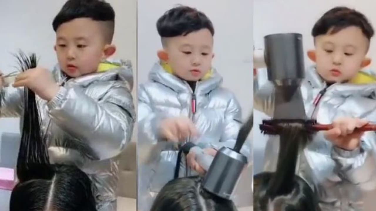 മുടി മുറിച്ച് മിന്നിക്കണോ? ഈ ആറ് വയസുകാരനെ കണ്ടാൽ മതി വൈറലായി വീഡിയോ മുടി മുറിച്ച് മിന്നിക്കണോ? ഈ ആറ് വയസുകാരനെ കണ്ടാൽ മതി വൈറലായി വീഡിയോ