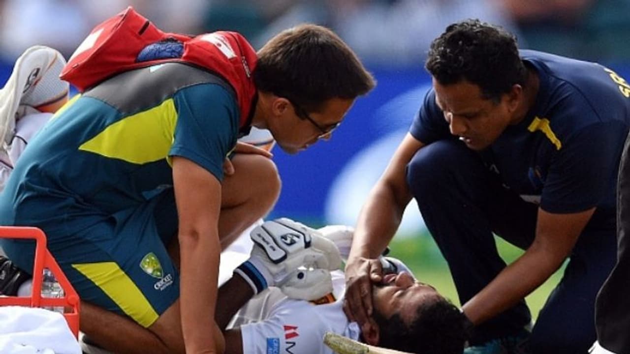 Australia vs Sri Lanka: Karunaratne hit by Cummins bouncer, stretchered off Australia vs Sri Lanka: Karunaratne hit by Cummins bouncer, stretchered off