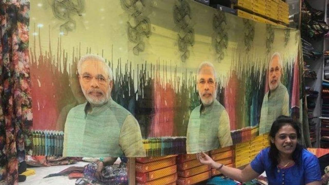 After Modi jackets, Modi fied saris hit Gujrat markets