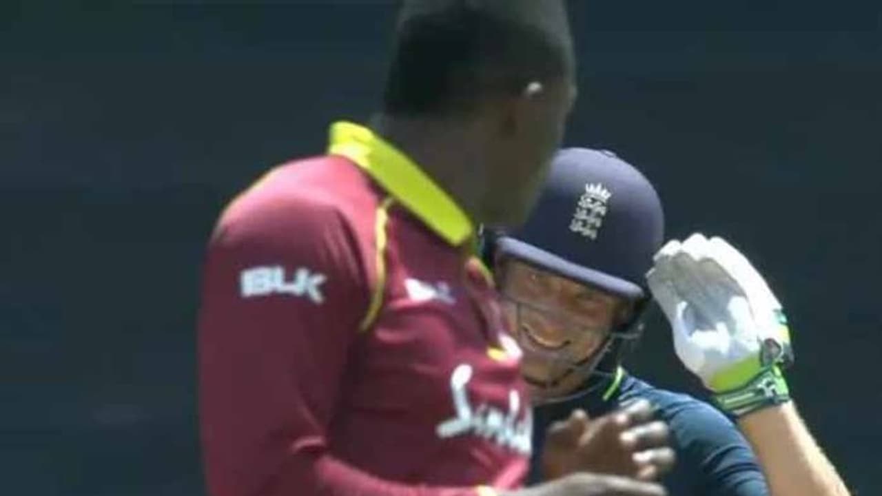 సిక్స్ కొట్టి సెల్యూట్: విండీస్ బౌలర్ను ఆటపట్టించిన బట్లర్ సిక్స్ కొట్టి సెల్యూట్: విండీస్ బౌలర్ను ఆటపట్టించిన బట్లర్