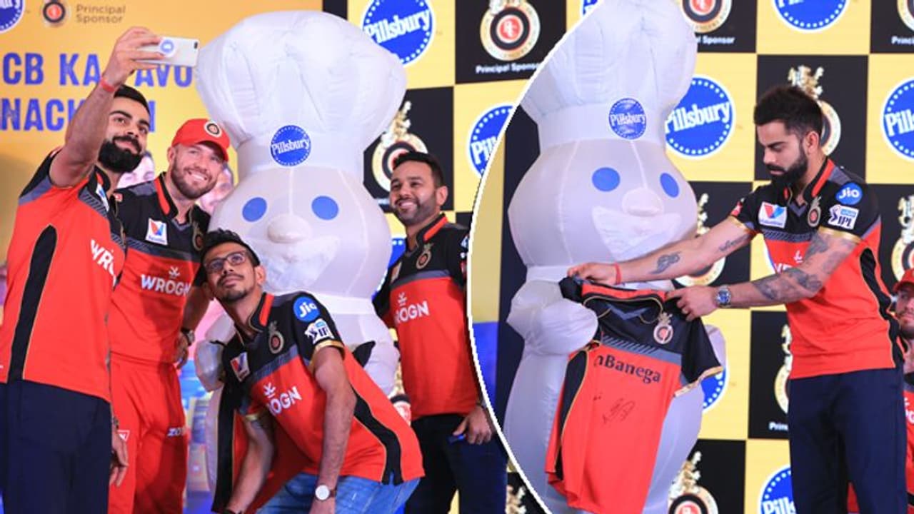 IPL 2019: RCB players gift jersey to Pillsbury mascot Doughboy in Bengaluru IPL 2019: RCB players gift jersey to Pillsbury mascot Doughboy in Bengaluru