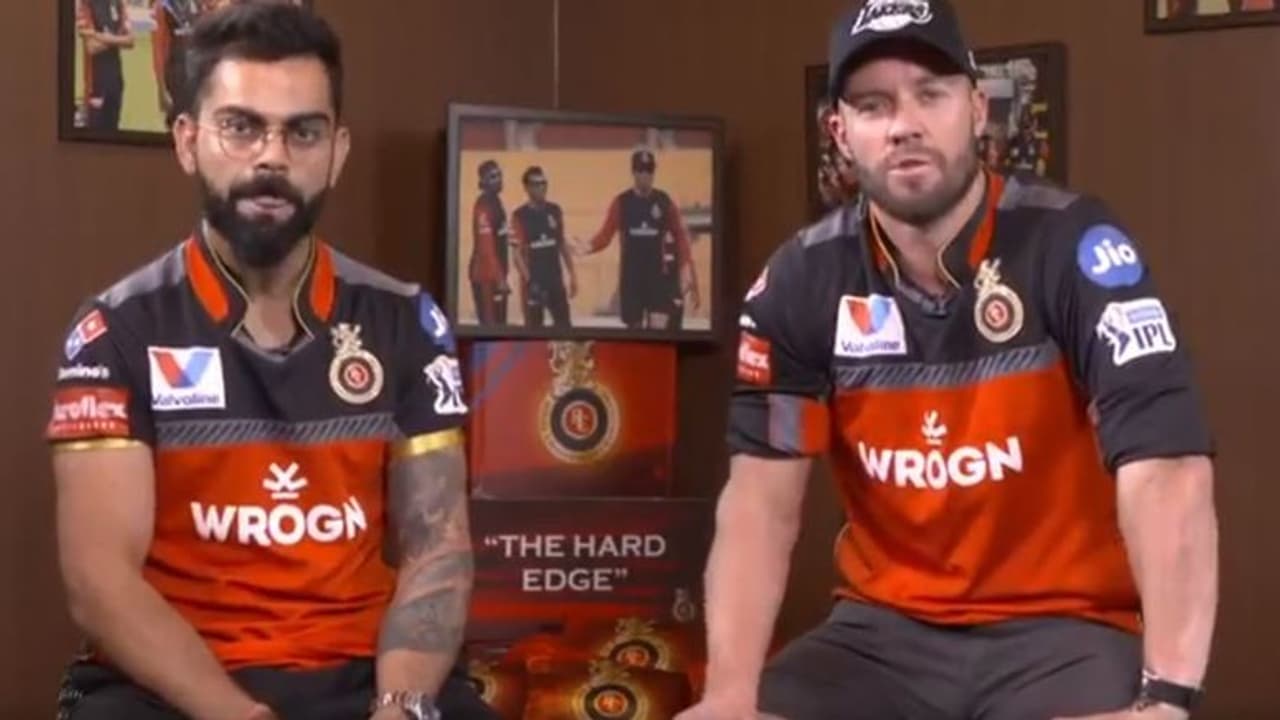 RCB's new music video featuring Virat Kohli, AB de Villiers and more will stump you (WATCH) RCB's new music video featuring Virat Kohli, AB de Villiers and more will stump you (WATCH)