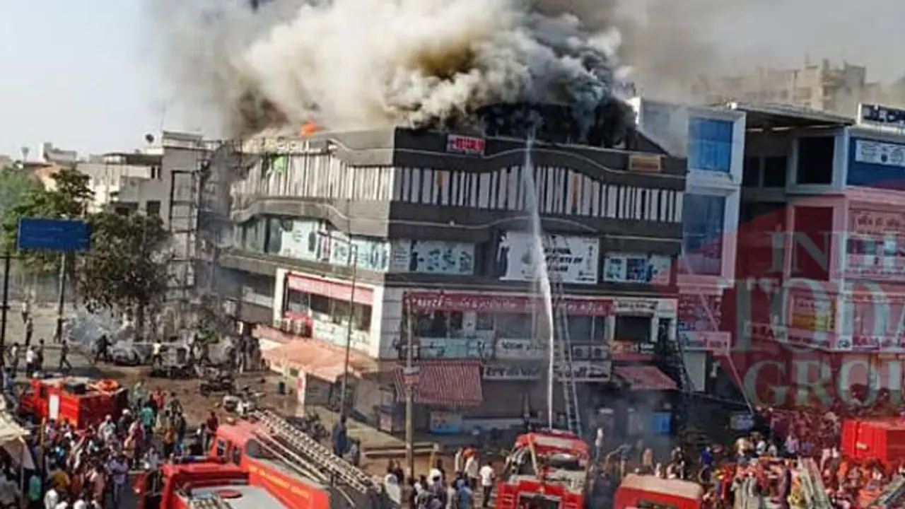 Surat fire: Builder and manager of complex arrested; death toll at 22