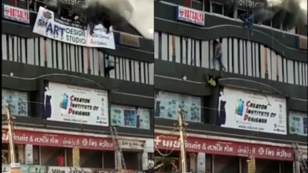 സൂറത്ത് തീപിടിത്തം: ഭയാനകമായ കാഴ്ച, കണ്ടുനില്ക്കാനാവാത്ത നിമിഷങ്ങളെന്ന് ദൃക്സാക്ഷികള് സൂറത്ത് തീപിടിത്തം: ഭയാനകമായ കാഴ്ച, കണ്ടുനില്ക്കാനാവാത്ത നിമിഷങ്ങളെന്ന് ദൃക്സാക്ഷികള്