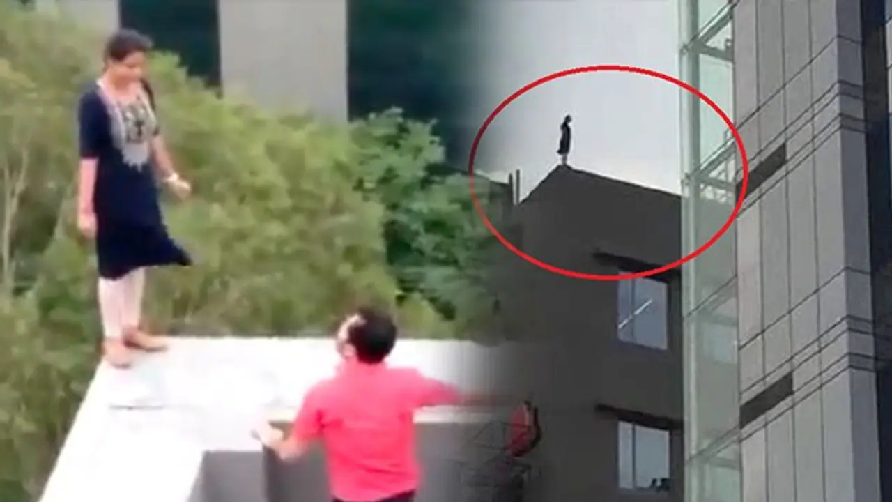 Video: नौकरी से निकाला तो छलांग लगाने को बिल्डिंग की 7वीं  मंजिल पर चढ़ गई लड़की