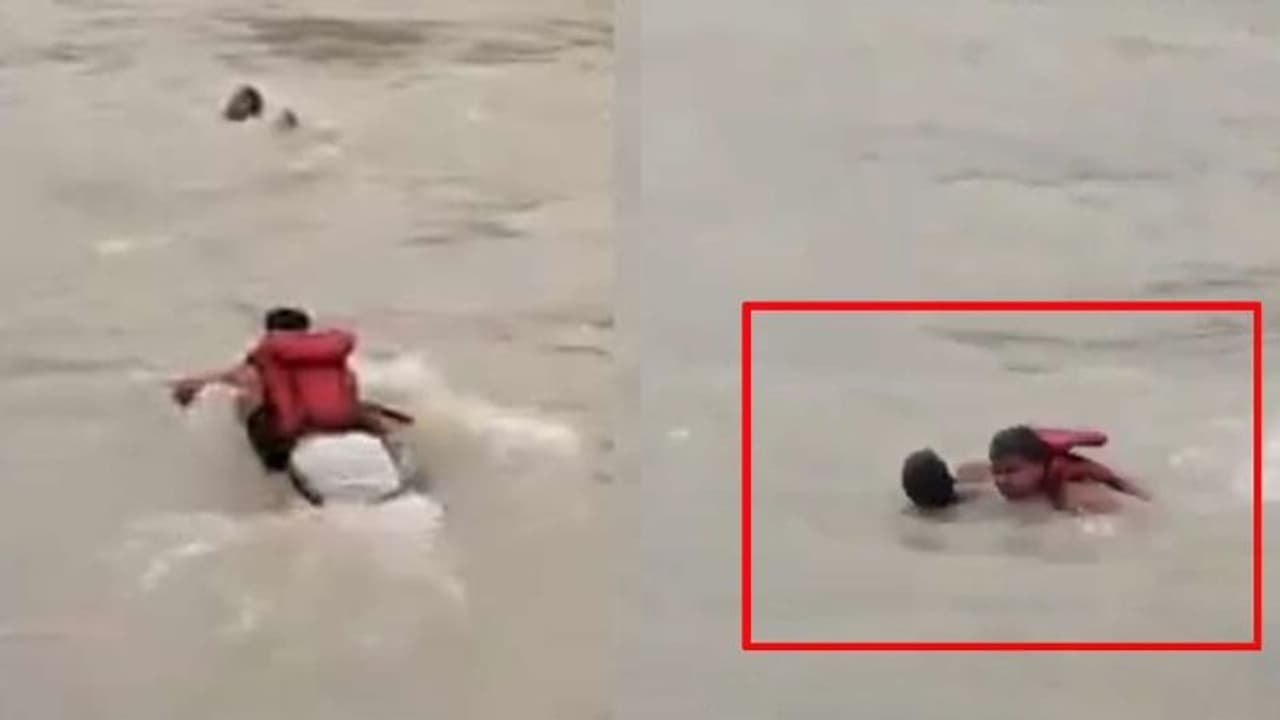 ഗംഗാ നദിയില് ഒഴുക്കില്പ്പെട്ടയാളെ നീന്തി കരയ്ക്കെത്തിച്ച് പൊലീസുകാരന്, വൈറലായി വീഡിയോ ഗംഗാ നദിയില് ഒഴുക്കില്പ്പെട്ടയാളെ നീന്തി കരയ്ക്കെത്തിച്ച് പൊലീസുകാരന്, വൈറലായി വീഡിയോ
