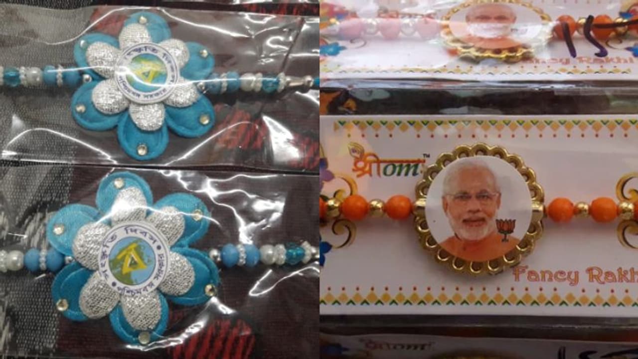 রাখীর বাজারে জোর লড়াই মোদী মমতার, টক্কর সমানে সমানে রাখীর বাজারে জোর লড়াই মোদী মমতার, টক্কর সমানে সমানে