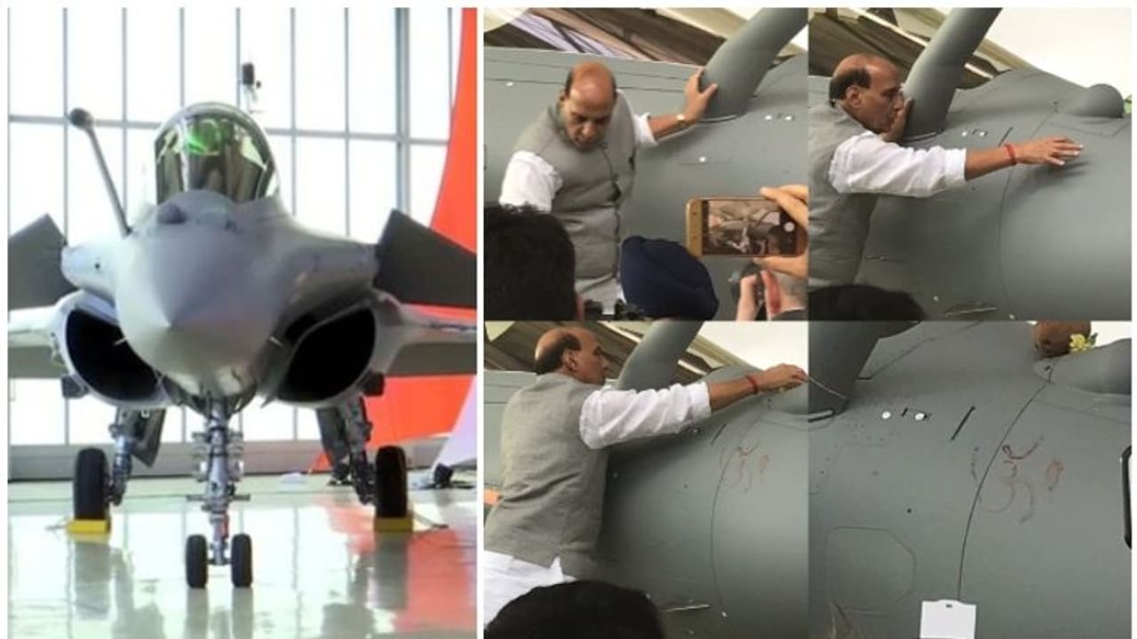 ആകാശത്തെ ഇന്ത്യയുടെ പുതിയ കരുത്ത്; ആദ്യ റഫാല് വിമാനത്തില് 'ഓം' എന്നെഴുതി പ്രതിരോധമന്ത്രിയുടെ പൂജ ആകാശത്തെ ഇന്ത്യയുടെ പുതിയ കരുത്ത്; ആദ്യ റഫാല് വിമാനത്തില് 'ഓം' എന്നെഴുതി പ്രതിരോധമന്ത്രിയുടെ പൂജ