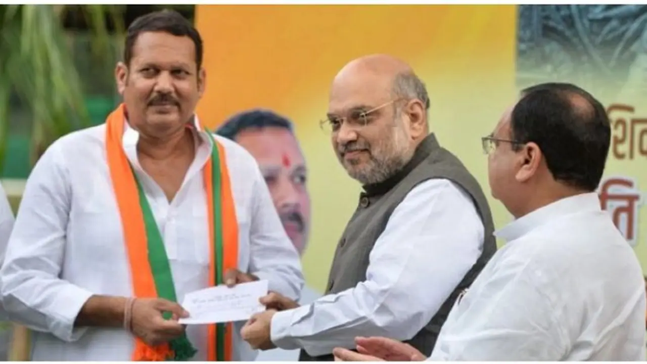 தேசியவாத காங்கிரஸ் எம்.பி.யாகி, பாஜகவில் சேர்ந்து மீண்டும் தேர்தலை சந்தித்தவருக்கு நேர்ந்த அதிர்ச்சி... சம்மடி அடி கொடுத்த வாக்காளர்கள்! தேசியவாத காங்கிரஸ் எம்.பி.யாகி, பாஜகவில் சேர்ந்து மீண்டும் தேர்தலை சந்தித்தவருக்கு நேர்ந்த அதிர்ச்சி... சம்மடி அடி கொடுத்த வாக்காளர்கள்!