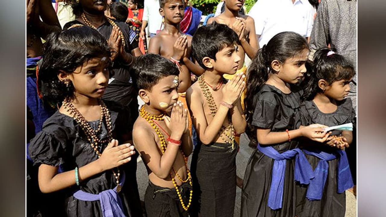 Kerala Police stops 12 year old girl from trekking to Sabarimala Kerala Police stops 12 year old girl from trekking to Sabarimala