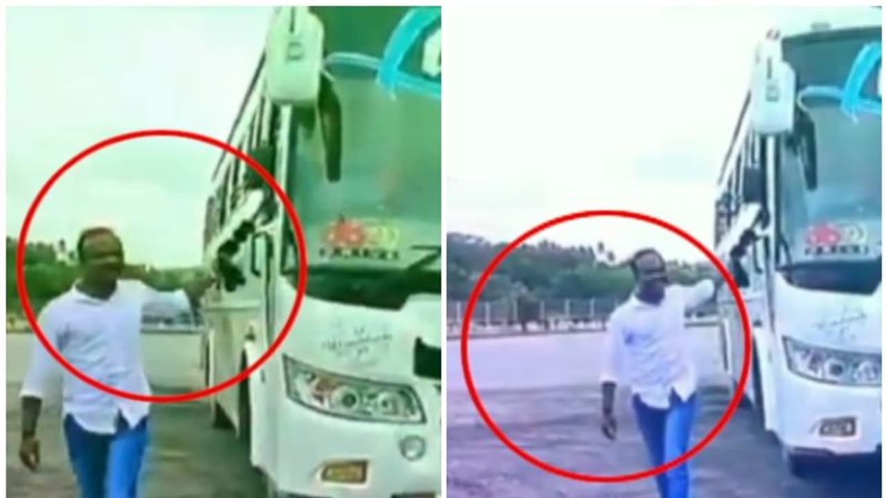 സ്കൂൾ കുട്ടികളുടെ വിനോദയാത്രക്കിടെ ഓടുന്ന ബസില്‍ നിന്നിറങ്ങി 'ആന നടത്തവുമായി' ഡ്രൈവര്‍: നടപടി