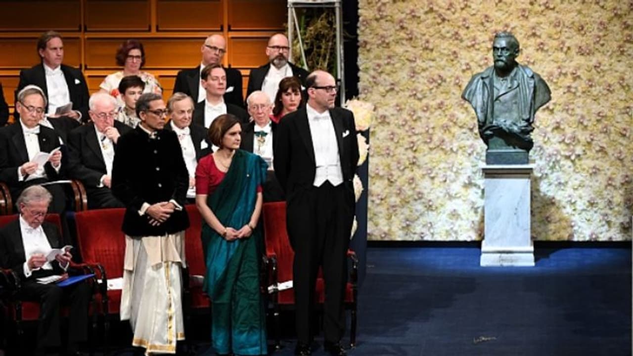 ಧೋತಿ ಕುರ್ತಾ, ಸೀರೆ: ನೊಬೆಲ್ ಸ್ವೀಕರಿಸಿದ ಬ್ಯಾನರ್ಜಿ ದಂಪತಿ! ಧೋತಿ ಕುರ್ತಾ, ಸೀರೆ: ನೊಬೆಲ್ ಸ್ವೀಕರಿಸಿದ ಬ್ಯಾನರ್ಜಿ ದಂಪತಿ!