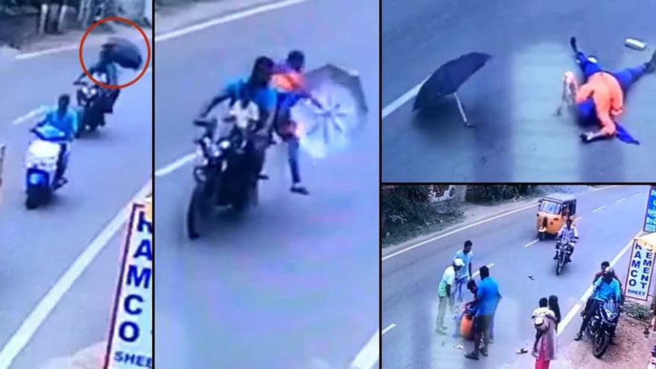 ഈ വീഡിയോ കാണൂ, പിന്നെ നിങ്ങള് ഒരിക്കലും ബൈക്കിലിരുന്ന് കുട തുറക്കില്ല! ഈ വീഡിയോ കാണൂ, പിന്നെ നിങ്ങള് ഒരിക്കലും ബൈക്കിലിരുന്ന് കുട തുറക്കില്ല!