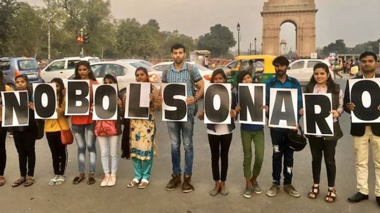 'ആമസോണിന്റെ ഘാതകനെ ഇന്ത്യക്ക് വേണ്ട'; ബോള്സൊനാരോക്കെതിരെ 'ഗോ ബാക്ക്' വിളിച്ച് ട്വിറ്റര് 'ആമസോണിന്റെ ഘാതകനെ ഇന്ത്യക്ക് വേണ്ട'; ബോള്സൊനാരോക്കെതിരെ 'ഗോ ബാക്ക്' വിളിച്ച് ട്വിറ്റര്