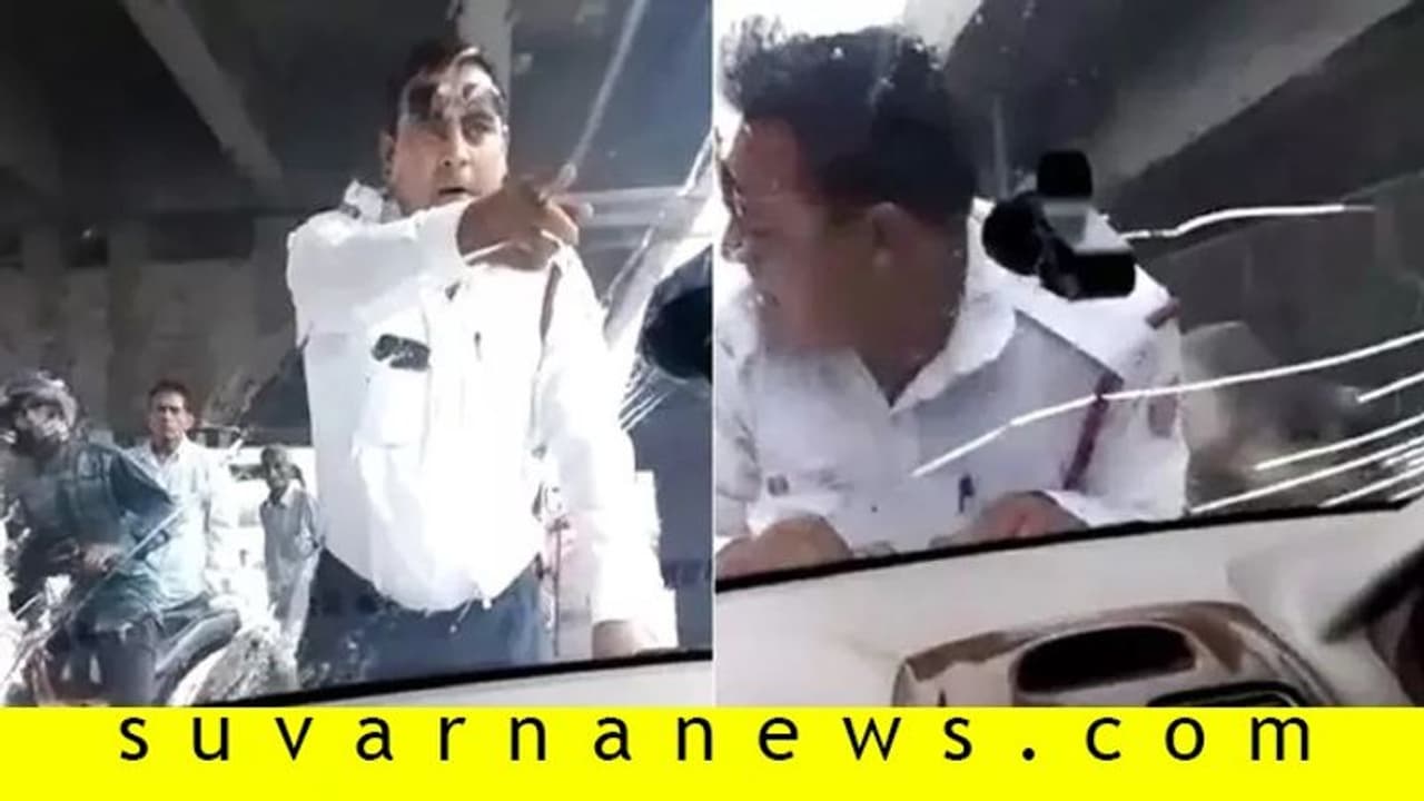 ಬಾನೆಟ್ ಏರಿದ್ದ ಪೊಲೀಸ್ 2 ಕಿ.ಮೀ ದೂರ ಎಳೆದೊಯ್ದ ಕಾರು ಚಾಲಕ! ಬಾನೆಟ್ ಏರಿದ್ದ ಪೊಲೀಸ್ 2 ಕಿ.ಮೀ ದೂರ ಎಳೆದೊಯ್ದ ಕಾರು ಚಾಲಕ!