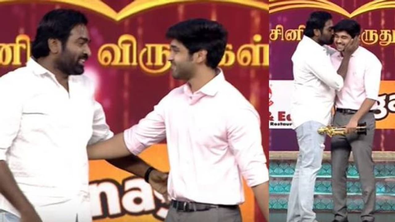 വിജയ് സേതുപതിയില് നിന്ന് 'മുത്തം' ചോദിച്ച് വാങ്ങി ധ്രുവ് വിക്രം വിജയ് സേതുപതിയില് നിന്ന് 'മുത്തം' ചോദിച്ച് വാങ്ങി ധ്രുവ് വിക്രം