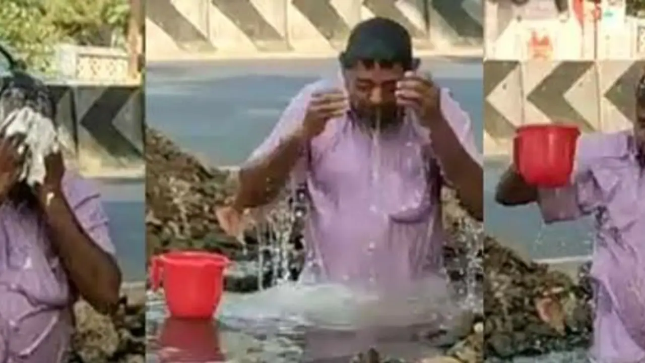 சாலையில் வீணாகிய தண்ணீர்..! சமூக ஆர்வலரின் செயலால் மிரண்டு போன அதிகாரிகள்..! சாலையில் வீணாகிய தண்ணீர்..! சமூக ஆர்வலரின் செயலால் மிரண்டு போன அதிகாரிகள்..!