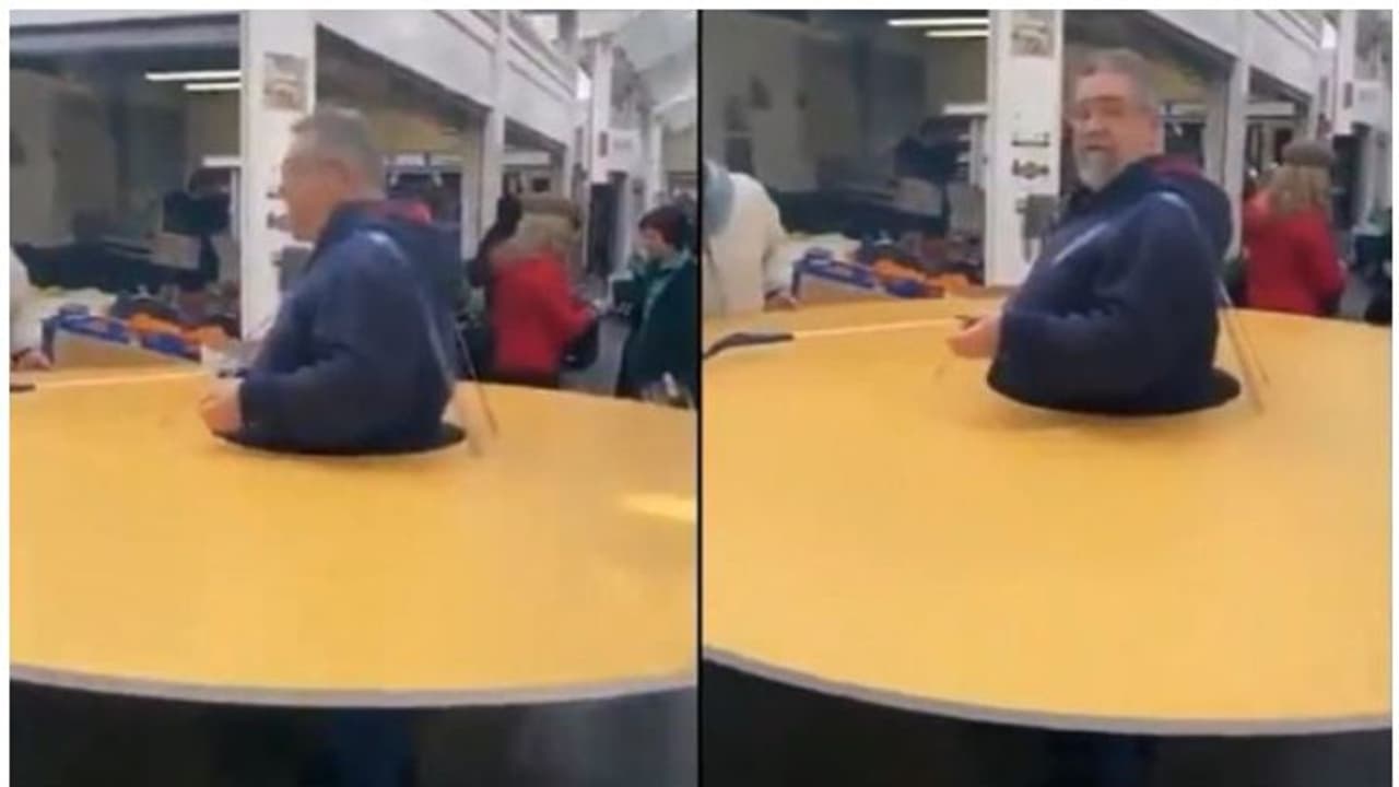 കൊറോണാ വൈറസിൽ നിന്ന് അകലം പാലിക്കാൻ 'ഡിസ്ക്' ധരിച്ച് ഇറ്റലിക്കാരന്റെ പ്രതിരോധം