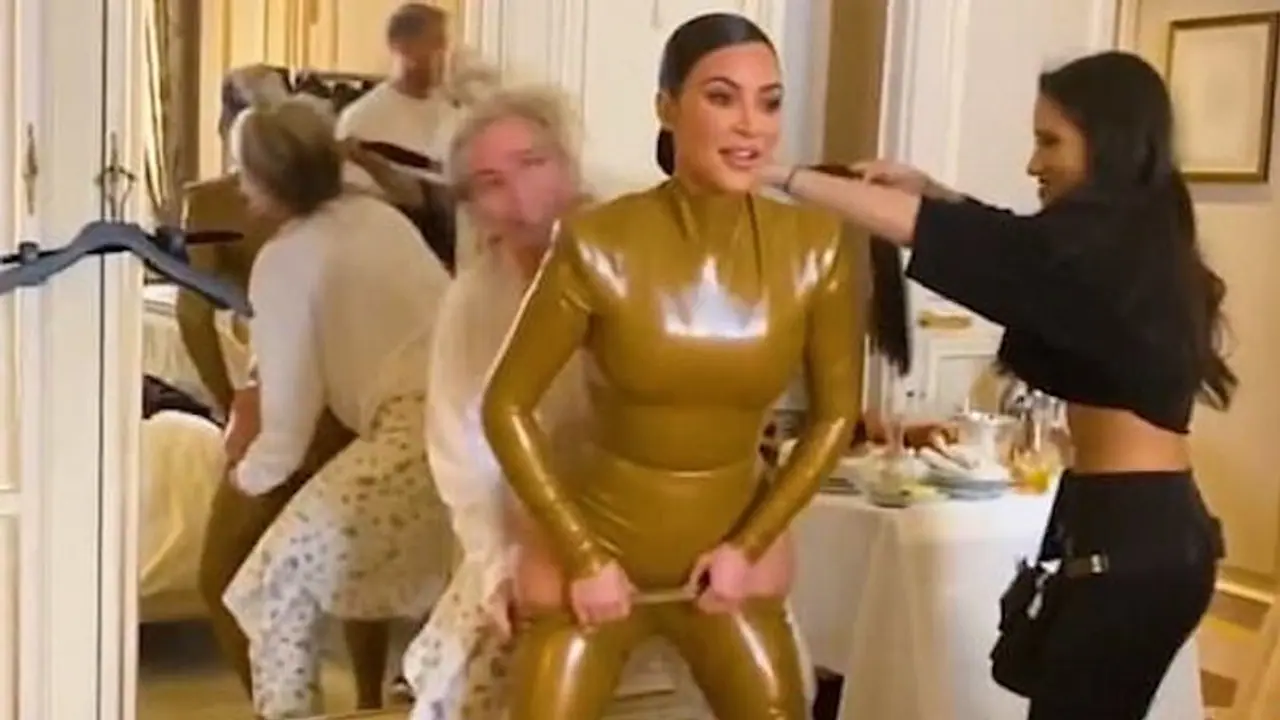 Here's how Kim Kardashian squeezes her bum into skin tight Balmain latex suits
