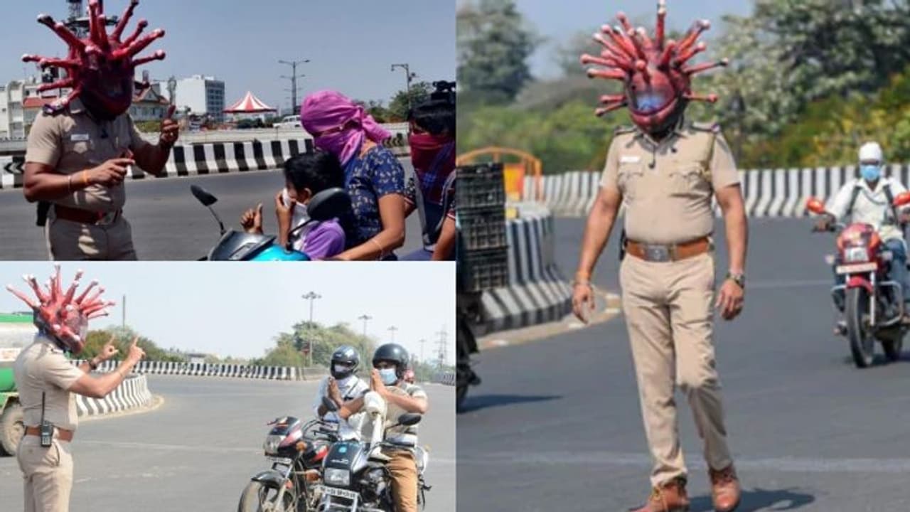 ലോക്ക് ഡൗണിൽ തെരുവിലിറങ്ങി ആളുകൾ; ബോധവത്ക്കരണത്തിന് 'കൊറോണ ഹെൽമെറ്റ്' ധരിച്ച് പൊലീസ്, വേറിട്ട മാതൃക