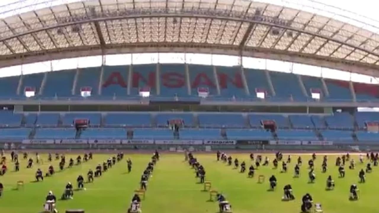 Coronavirus: Watch how job applicants sit 5 metres apart to write exam at South Korea football stadium