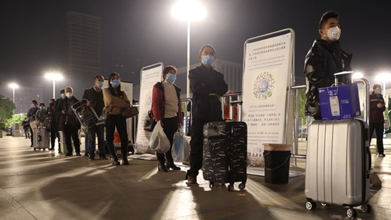 Thousands leave China's Wuhan as travel ban ends after 2 months Thousands leave China's Wuhan as travel ban ends after 2 months