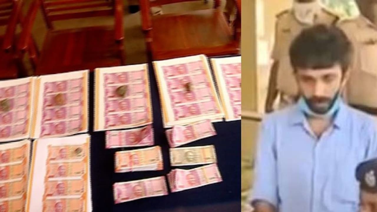 പന്ത്രണ്ടര ലക്ഷത്തിന്റെ കള്ളനോട്ടുമായി യുവാവ് പിടിയില്; നോട്ടടിക്കുന്ന പ്രിന്റര് കണ്ടെത്തി പന്ത്രണ്ടര ലക്ഷത്തിന്റെ കള്ളനോട്ടുമായി യുവാവ് പിടിയില്; നോട്ടടിക്കുന്ന പ്രിന്റര് കണ്ടെത്തി