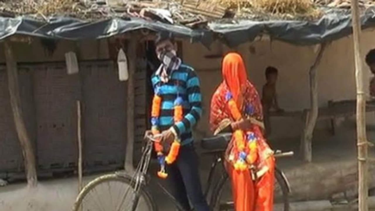 Baraat on bicycle: Groom pedals 100 km to tie the knot, brings his bride home amid lockdown Baraat on bicycle: Groom pedals 100 km to tie the knot, brings his bride home amid lockdown