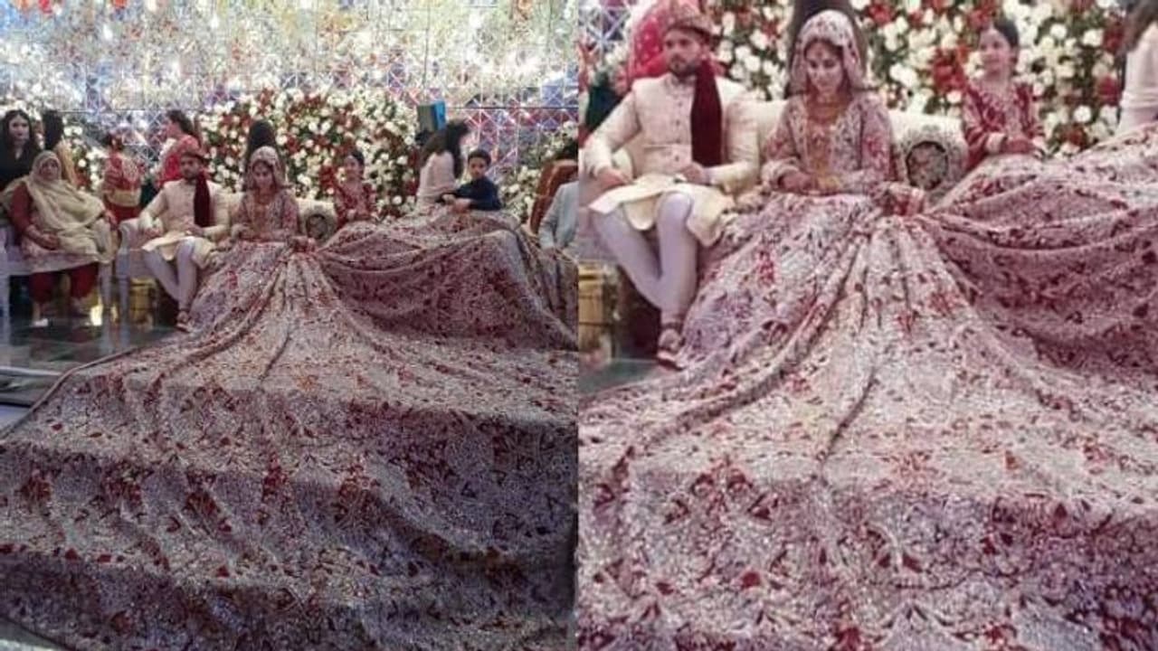 വേദിയില്‍ പരന്നുകിടക്കുന്ന വധുവിന്‍റെ ലെഹങ്ക, ഭാരം 100 കിലോ; അമ്പരന്ന് സോഷ്യല്‍ മീഡിയ