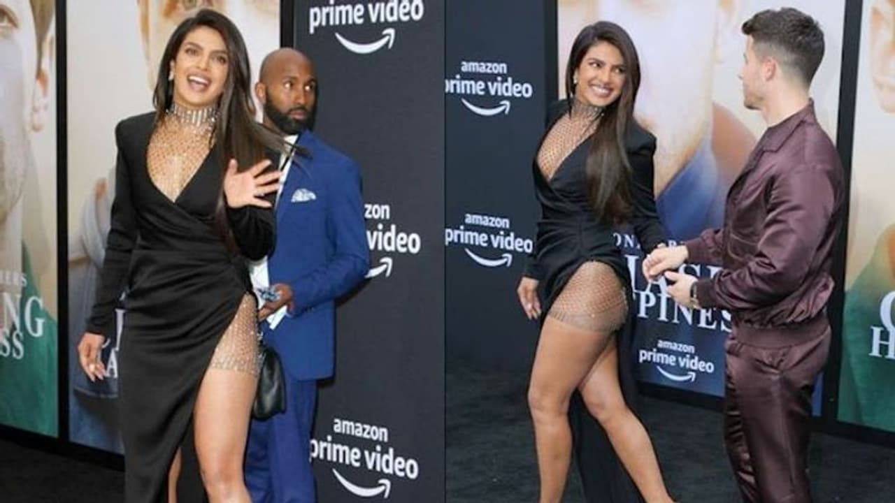 বিমানবন্দরে প্রিনিক, পাপারাৎজির ক্যামেরায় ধরা পড়ল নিকের ফোনের সিক্রেট