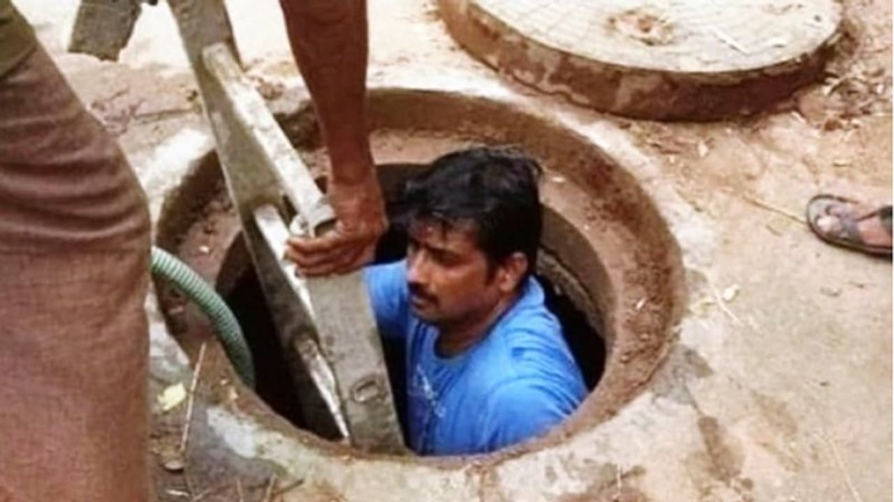 Karnataka: BJP corporator shows how it’s done, gets into manhole to unclog it