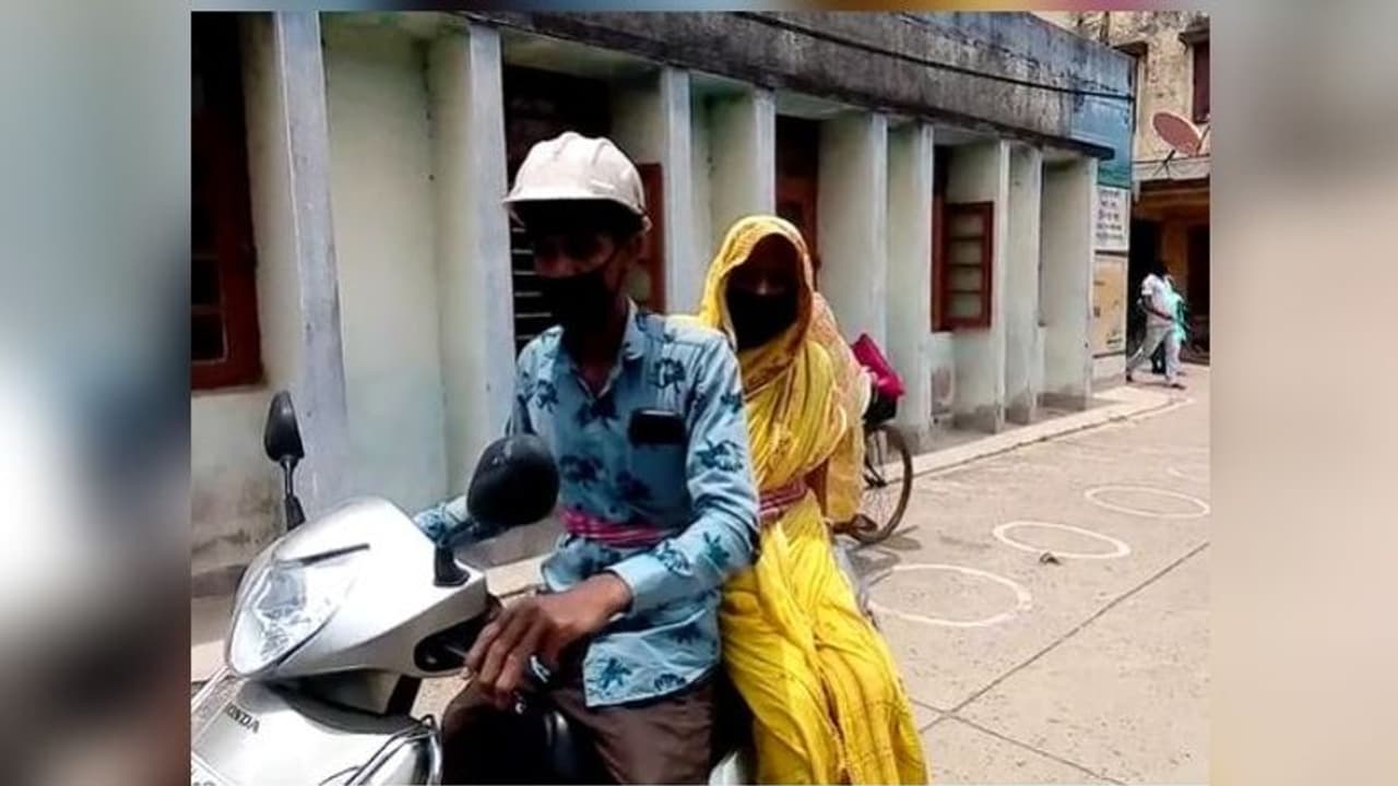 করোনা উপসর্গ থাকায় মিলল না অ্যাম্বুলেন্স, মাকে বাইকে বেঁধে হাসপাতাল নিল ছেলে করোনা উপসর্গ থাকায় মিলল না অ্যাম্বুলেন্স, মাকে বাইকে বেঁধে হাসপাতাল নিল ছেলে