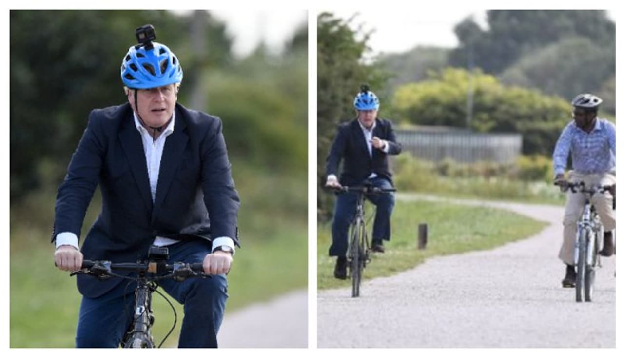 ব্রিটেনে উড়ল মেড ইন ইন্ডিয়ার জয়ধ্বজা, ভারতের সাইকেলে সওয়ারি হলেন প্রধানমন্ত্রী বরিস জনসন ব্রিটেনে উড়ল মেড ইন ইন্ডিয়ার জয়ধ্বজা, ভারতের সাইকেলে সওয়ারি হলেন প্রধানমন্ত্রী বরিস জনসন