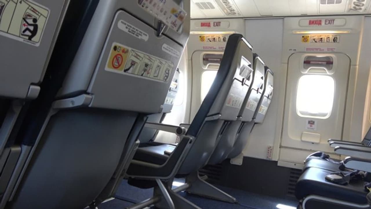 UK official's bodyguard leaves gun on plane, suspended UK official's bodyguard leaves gun on plane, suspended