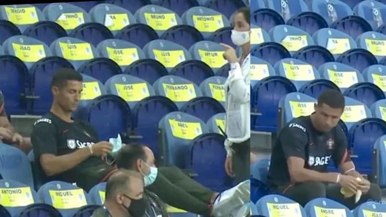 মুখে ছিল না মাস্ক, হাত ফসকে পড়ে যায় কলা, গ্যালারিতে থেকেও আকর্ষণের কেন্দ্রে রোনাল্ডো মুখে ছিল না মাস্ক, হাত ফসকে পড়ে যায় কলা, গ্যালারিতে থেকেও আকর্ষণের কেন্দ্রে রোনাল্ডো