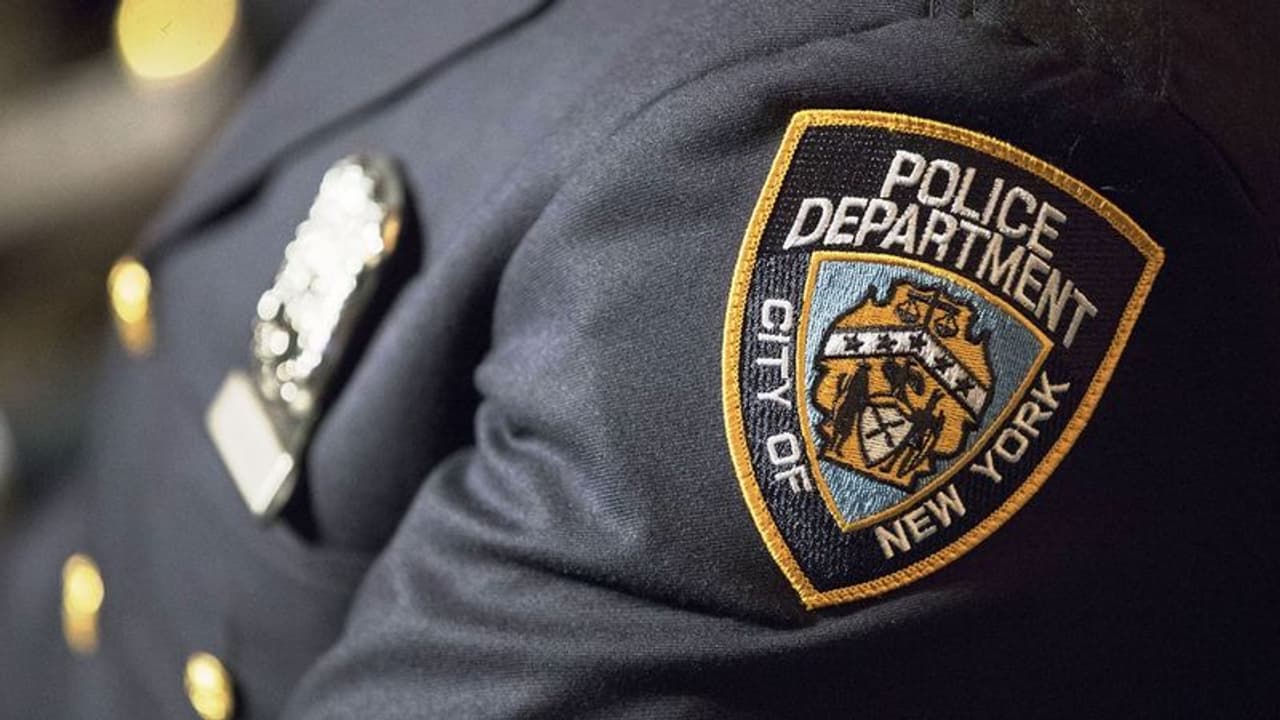 New York Police Officer accused of spying for China, suspended New York Police Officer accused of spying for China, suspended