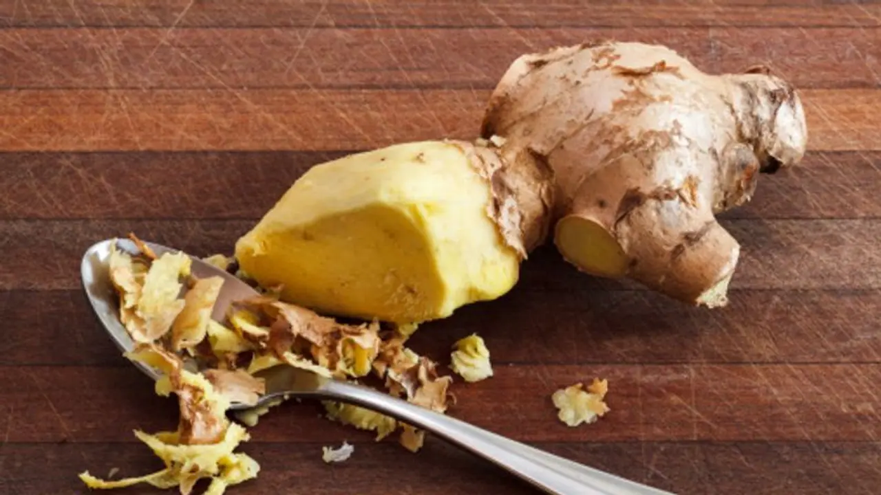 peeling ginger peeling ginger