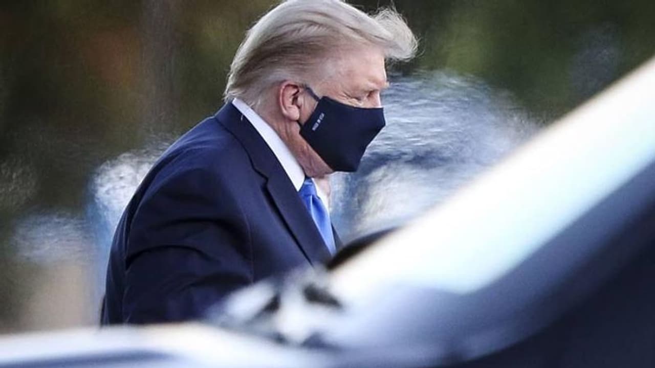 'Infected' Donald Trump steps out on to the streets to meet 'patriots' 'Infected' Donald Trump steps out on to the streets to meet 'patriots'
