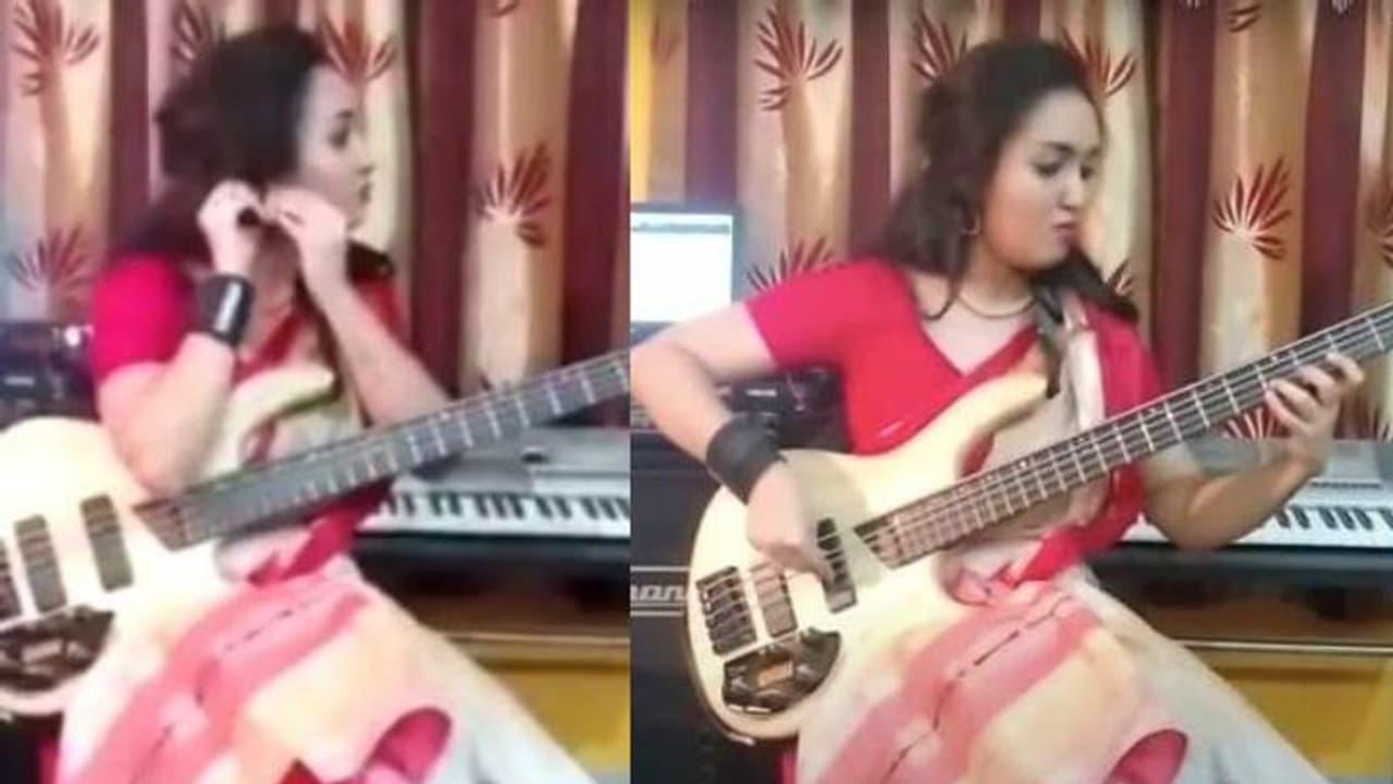 വേഷം സാരി, കയ്യിൽ ബാസ് ഗിത്താർ; ഗംഭീരമെന്ന് സോഷ്യല് മീഡിയ; വീഡിയോ വൈറല് വേഷം സാരി, കയ്യിൽ ബാസ് ഗിത്താർ; ഗംഭീരമെന്ന് സോഷ്യല് മീഡിയ; വീഡിയോ വൈറല്