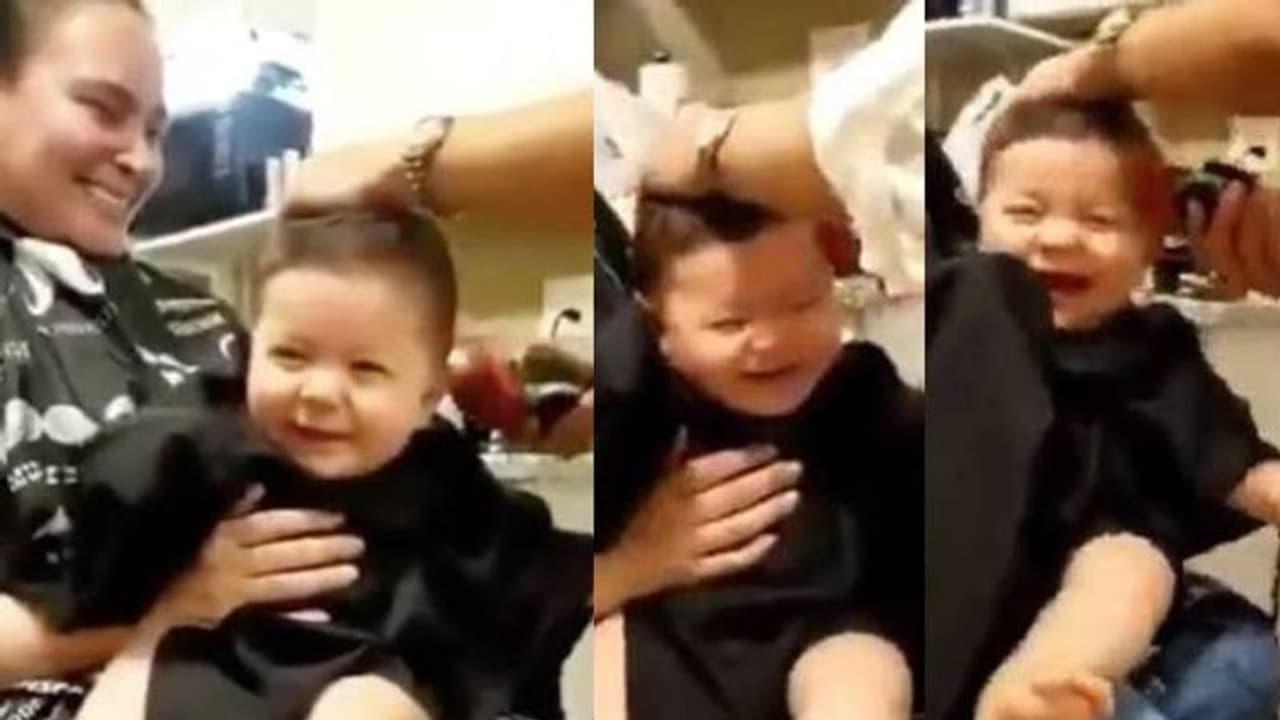 മുടി വെട്ടുന്നതിനിടയില്‍ ഇങ്ങനെ ചിരിക്കാമോ; വൈറലായി വീഡിയോ...