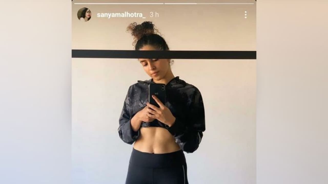 Sanya Malhotra shares post workout picture falunting her abs Sanya Malhotra shares post workout picture falunting her abs